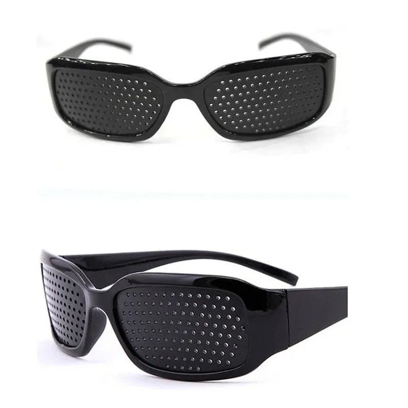 Black vision correction pinhole glasses with a perforated lens pattern