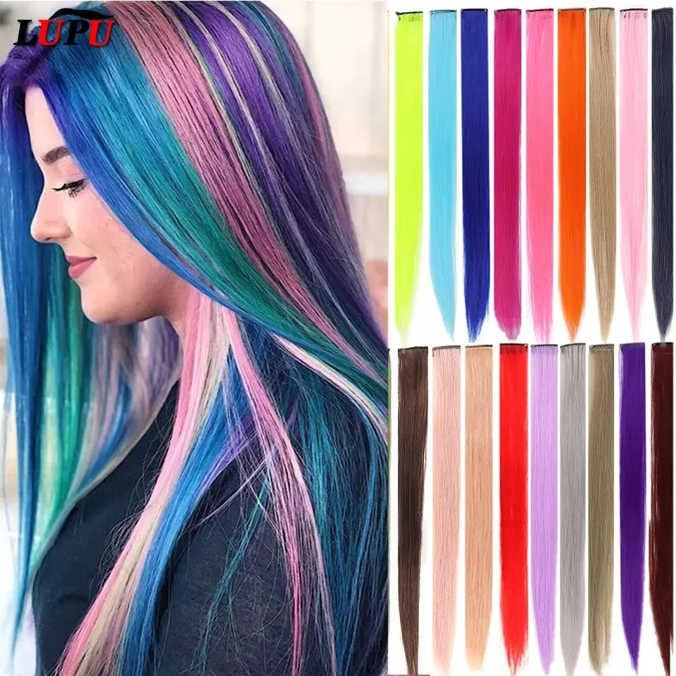 A woman shows off long, multi-colored straight hair extensions featuring shades of blue, pink, purple, and green.