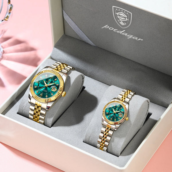 A pair of matching couple watches with luminous hands and date display presented in a gray box.