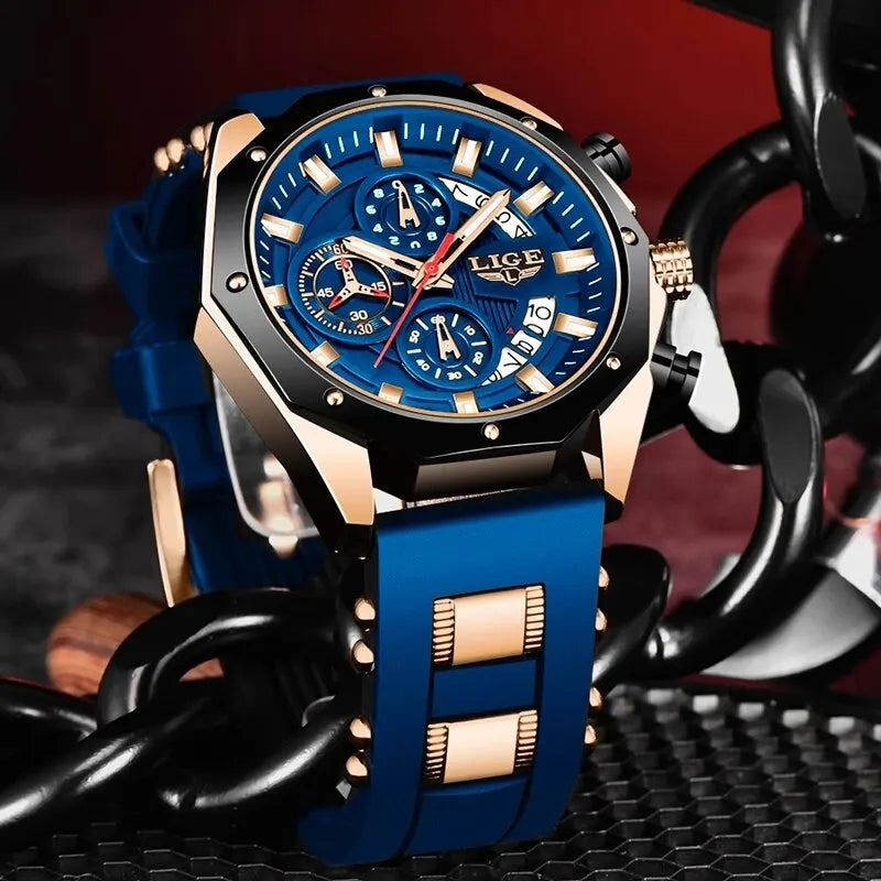 A close-up of a blue and rose gold men's luxury quartz sport watch with a chronograph on a black strap.