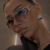 Close-up portrait of a woman wearing Steampunk Gradient Mirror Sunglasses.