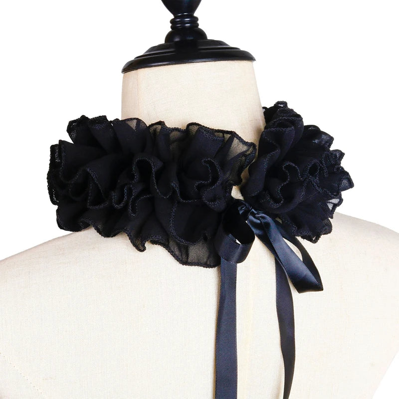 Black decorative pleated ruffle stand collar sweater displayed on a mannequin.