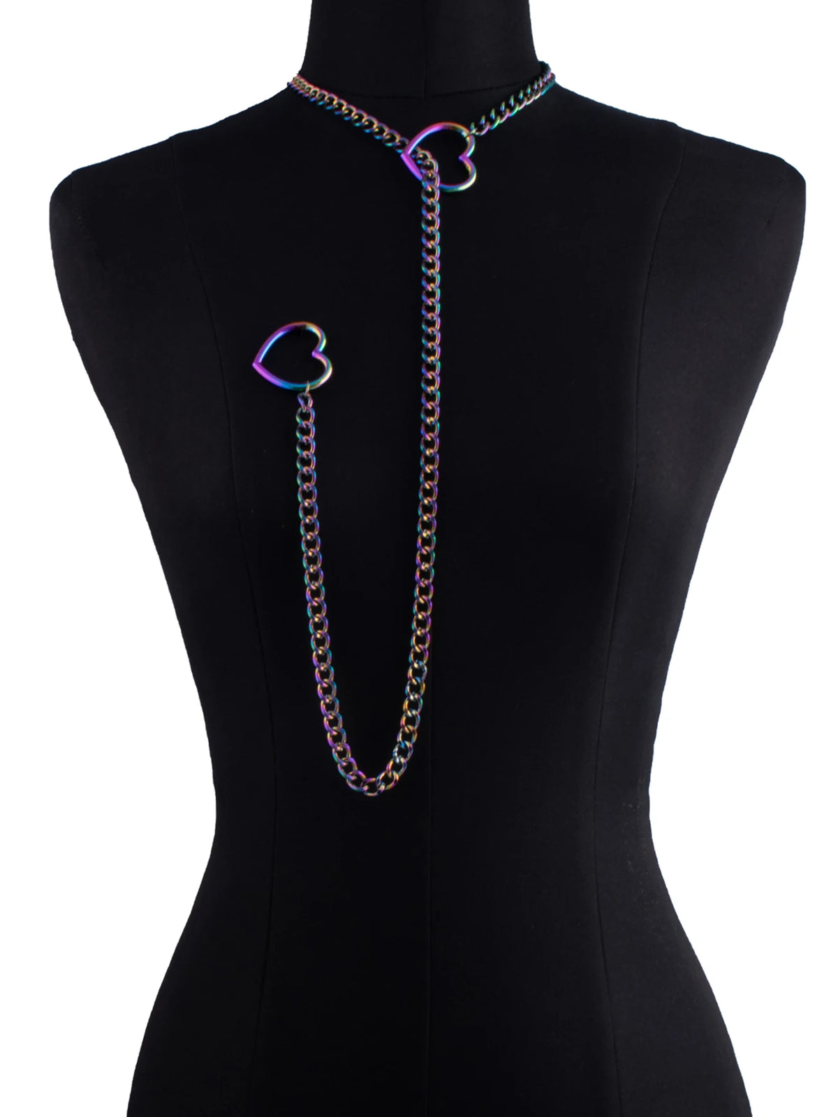 A chunky heart slip chain necklace with iridescent purple and green accents displayed on a black mannequin.