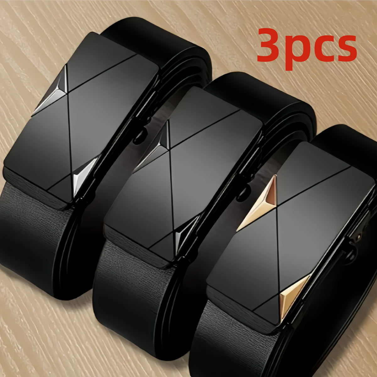 Three black men's automatic buckle casual belts displayed on a wooden surface.