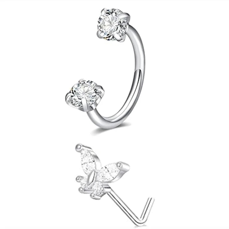 Silver horseshoe nose ring set featuring a hoop and a butterfly charm.