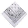 White paisley bandana fabric with black decorative patterns folded into a square shape