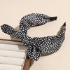 Black and white leopard print retro bow hairband tied in a knot