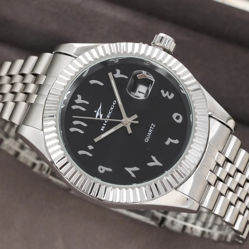 A silver luxury quartz men's wristwatch with a black dial and date display on a gray background.