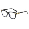 Black square eyeglasses with gold accents and clear lenses