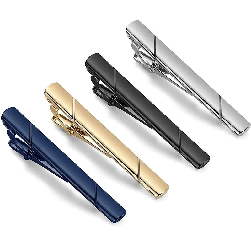 A set of four 14K copper classic tie clip jewelry pieces in blue, gold, and black finishes.