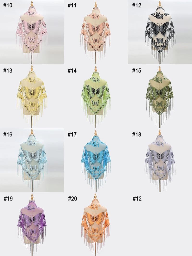 A collection of twenty-one elegant printed butterfly lace scarves and shawls displayed on hangers.