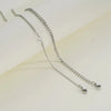 A set of dainty stainless steel heart link bracelets for couples displayed on a light background.