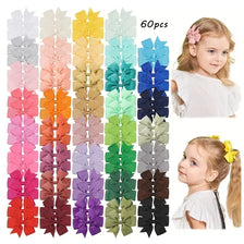 Assorted grosgrain ribbon hair bow clips in various colors and shades for girls
