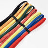 A collection of colorful adjustable eyewear lanyards or necklaces arranged diagonally.