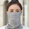 A woman wearing a gray camouflage ice silk breathable face and neck gaiter covering her lower face and neck.