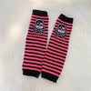 Black and pink striped fingerless socks featuring a skull graphic.
