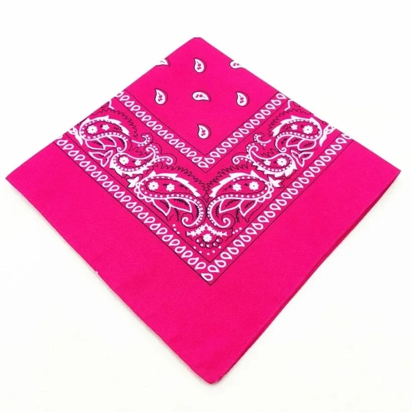 Bright pink cotton bandana scarf featuring white paisley patterns