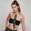 A woman models a black strapless top and a crystal rhinestone sequin neck tie necklace.