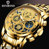 A close-up of a gold-toned watch with intricate mechanical details and a gold bracelet.