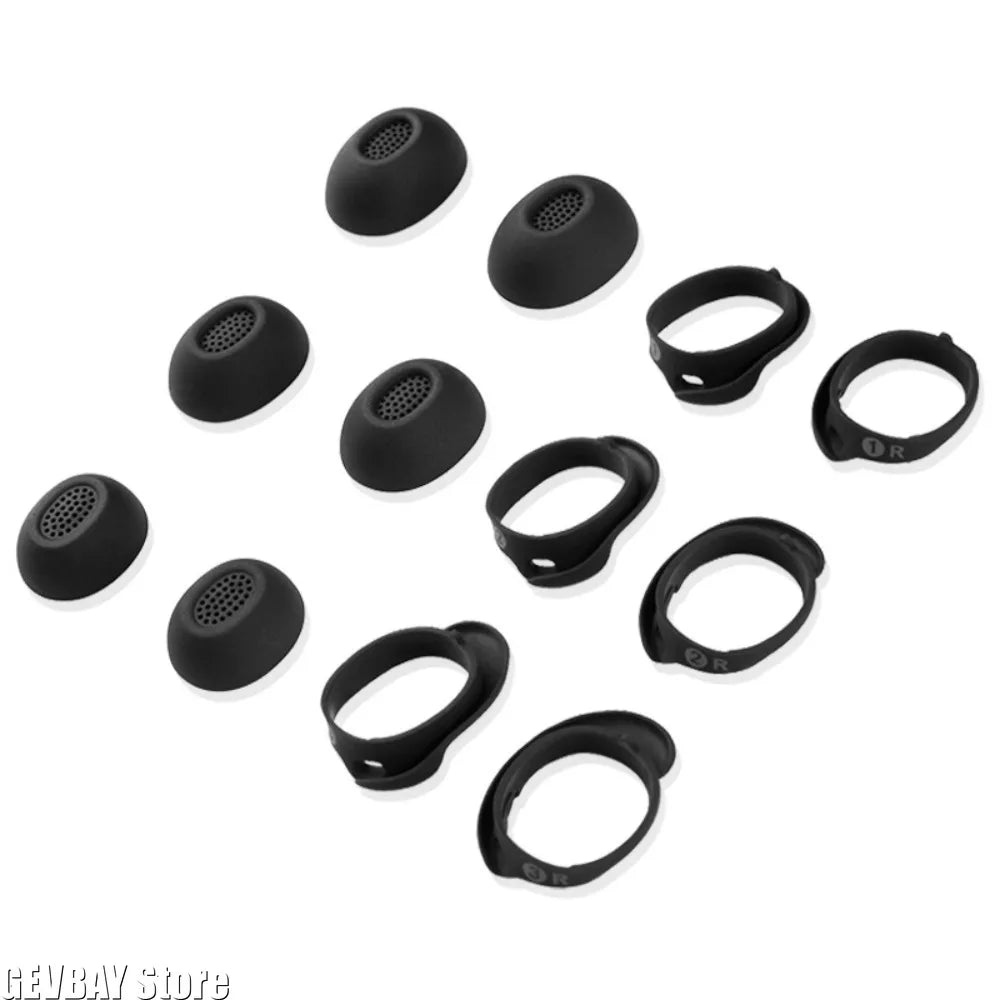 A collection of black silicone ear tips for true wireless earbuds, shown from above.