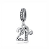 A silver family tree charm jewelry piece featuring a detailed design with sparkling stones.