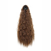 A long, brown, kinky curly hair extension ponytail with a black clip-in top.