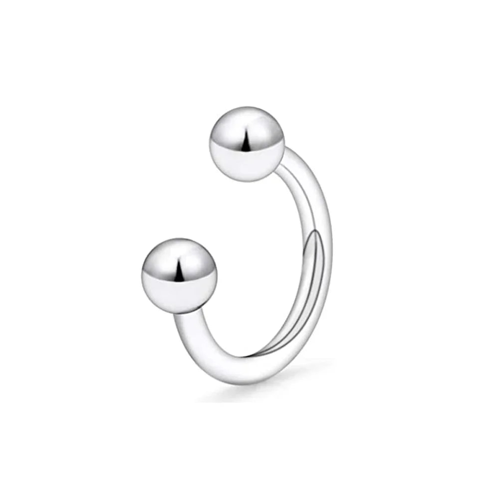 A silver crystal horseshoe barbell ring set with spherical beads.