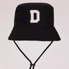 Black sun hat with a white letter D embroidered on the front and an adjustable cord.