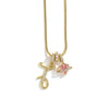 A gold chain necklace featuring an alphabet letter pendant shaped like a flower.