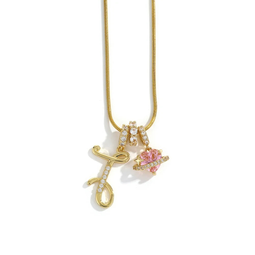 A gold chain necklace featuring an alphabet letter pendant shaped like a flower.