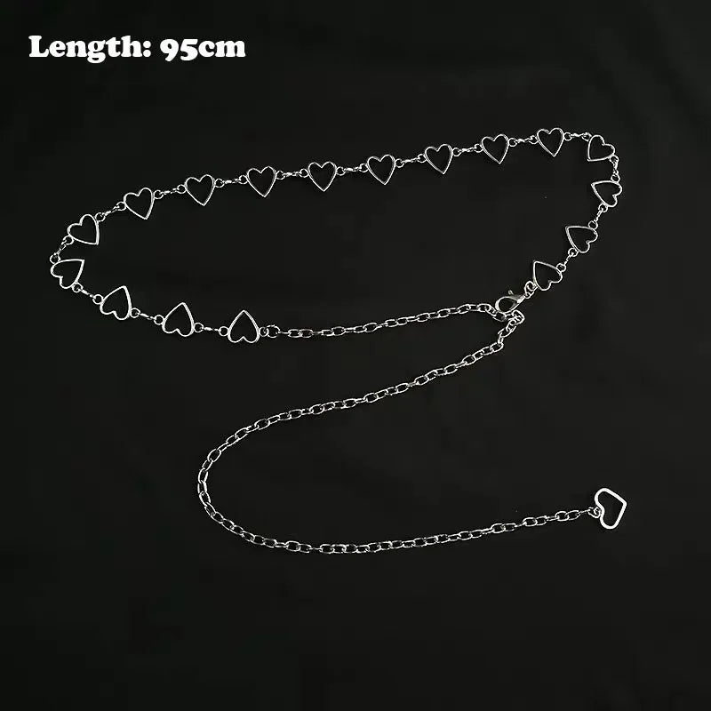 A black chain belt featuring a continuous line of heart-shaped crystals, measuring 95cm in length.