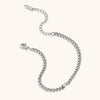 Silver charm bracelet featuring round water drop zircon charms