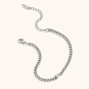 Silver charm bracelet featuring round water drop zircon charms