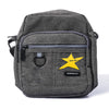 A dark gray fabric pouch with a zippered compartment and a yellow star graphic on the front.