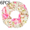 Seis gomas de tela con estampado floral de satén en patrones rosa y verde