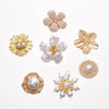 A collection of floral button cufflinks featuring pearl and gold accents.