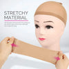 A hand is demonstrating a stretchy material used for hair netting, showing its flexibility on a mannequin head.