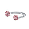 A pink crystal horseshoe barbell ring set with a silver surgical steel body jewelry band.