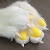 White furry gloves with yellow paw pads and white claws