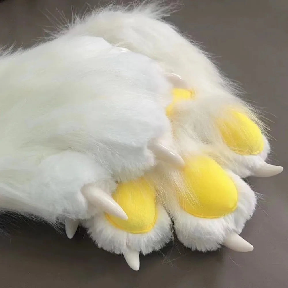 White furry gloves with yellow paw pads and white claws