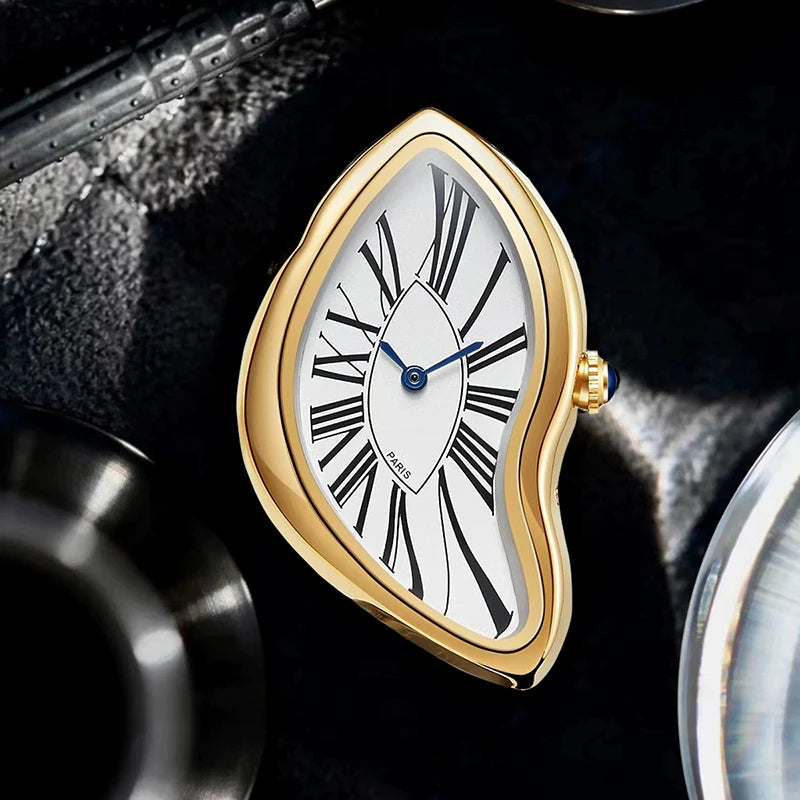 A close-up of a gold-toned fashion quartz wristwatch with a white dial and Roman numerals set against a dark background.