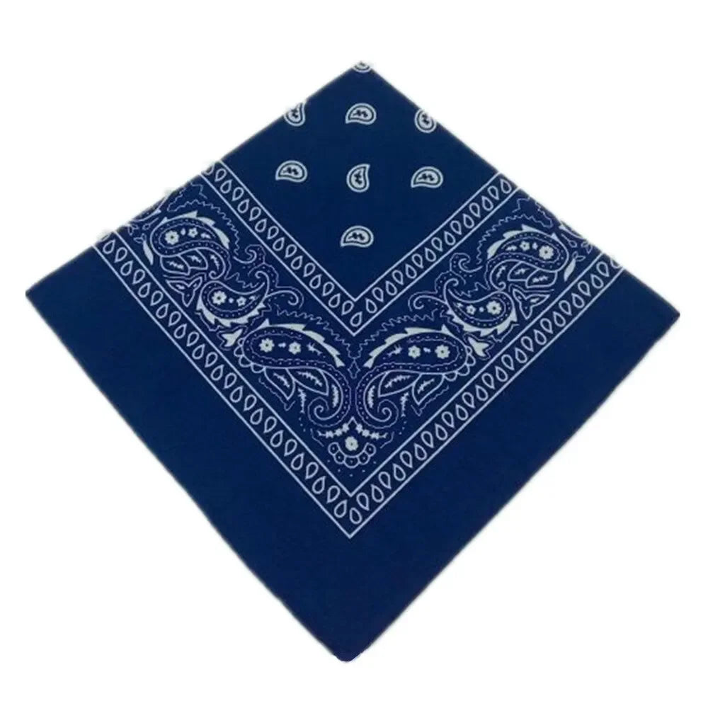 Navy blue bandana featuring white paisley and geometric patterns