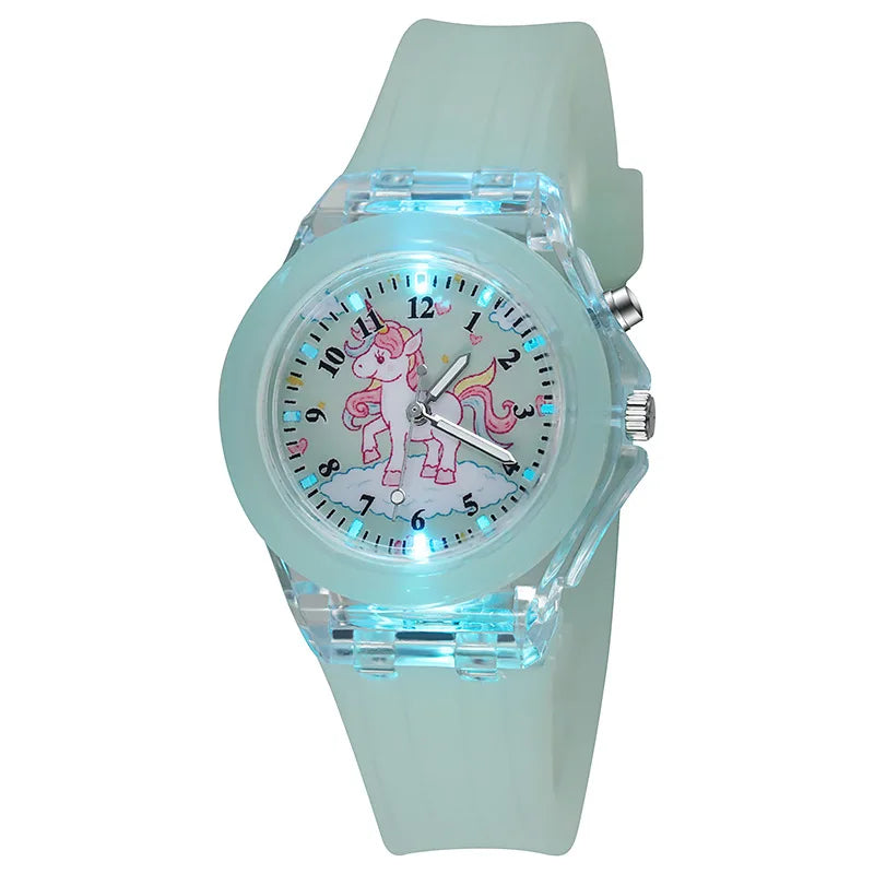 A light mint green fashion watch featuring a pink unicorn design on the face and a clear crystal case.