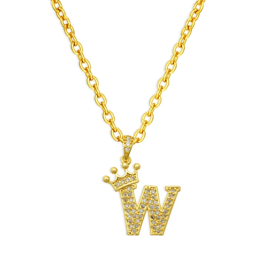 Gold chain necklace with a diamond-encrusted letter W and crown pendant