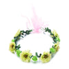 A green floral wreath headband with pink sheer ribbon, featuring small roses and leaves.