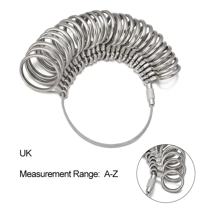 A set of professional metal ring sizers, silver-toned, coiled and arranged for measurement.