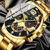 A close-up of a gold-toned analog watch with a black dial and gold accents, resting on dark fabric.