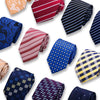 A collection of men's silk neckties featuring various patterns including floral, paisley, striped, and checkered designs.