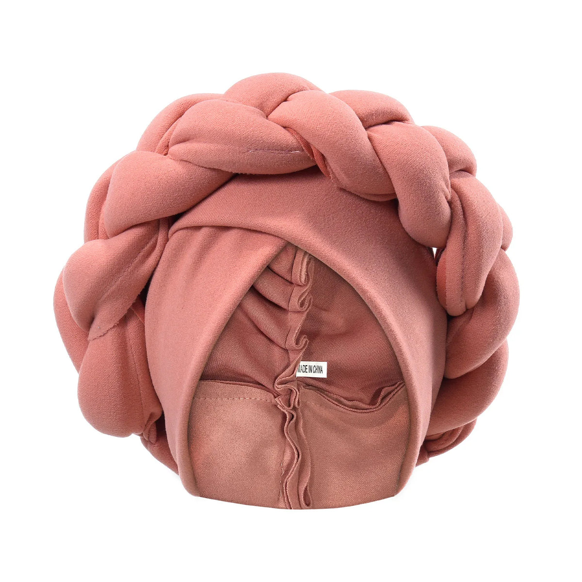 A soft dusty rose braided turban cap for African party headwear