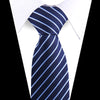 A navy blue striped silk necktie with light blue diagonal stripes worn under a white dress shirt.